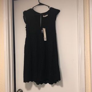 Black babydoll style dress with V-neck and cap sleeve - new with tags